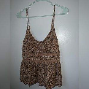 a super cute and fun tank top! pairs perfectly with a pair of jeans!!